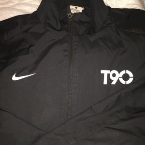 Nike black windbreaker..snag on right pocket
